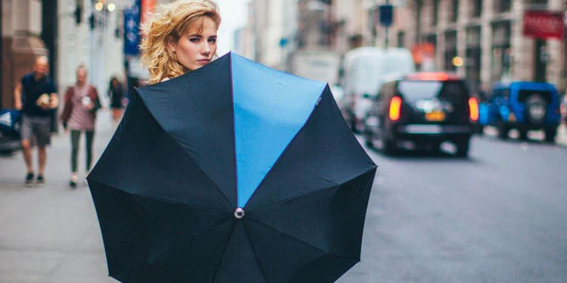 Lady holding a Davek Umbrella